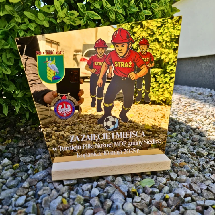 Złote  lustro statuetka na zawody.webp